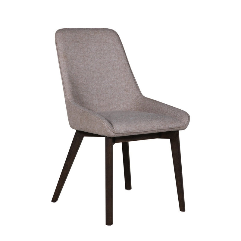 The Axton Dining Chair features a light gray upholstered seat and backrest, angled slightly backward, with four dark wooden legs—an ideal match for the Ariya table.