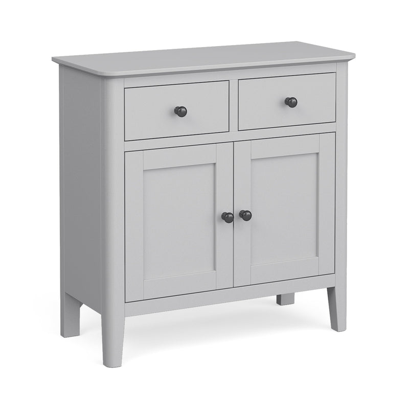 A small gray sideboard with two drawers and two doors, each with dark knobs.