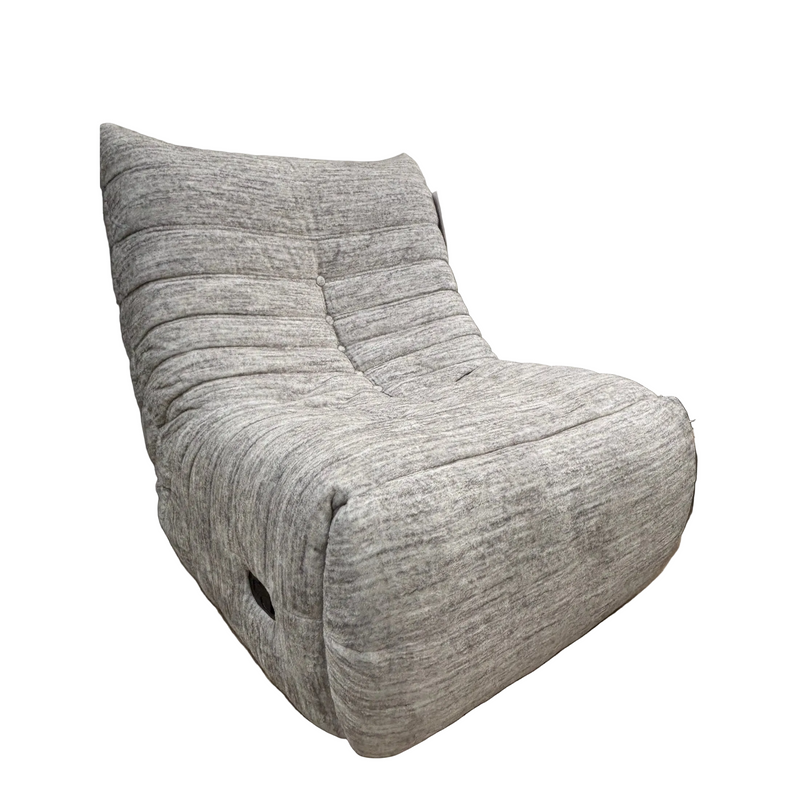 The Ryder Occasional Chair features light gray textured upholstery, a low wide seat, and an angled backrest with horizontal stitching. Shown against a plain white background.