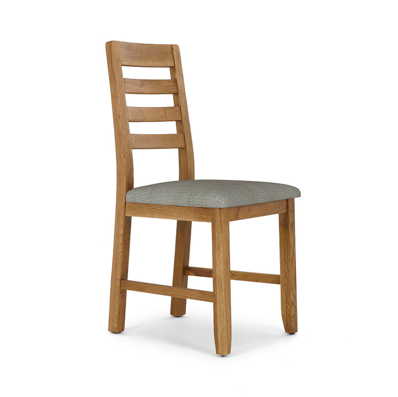 The Edson Dining Chair features a classic ladder-back design and a cushioned gray PU seat, displayed at an angle against a plain white background.