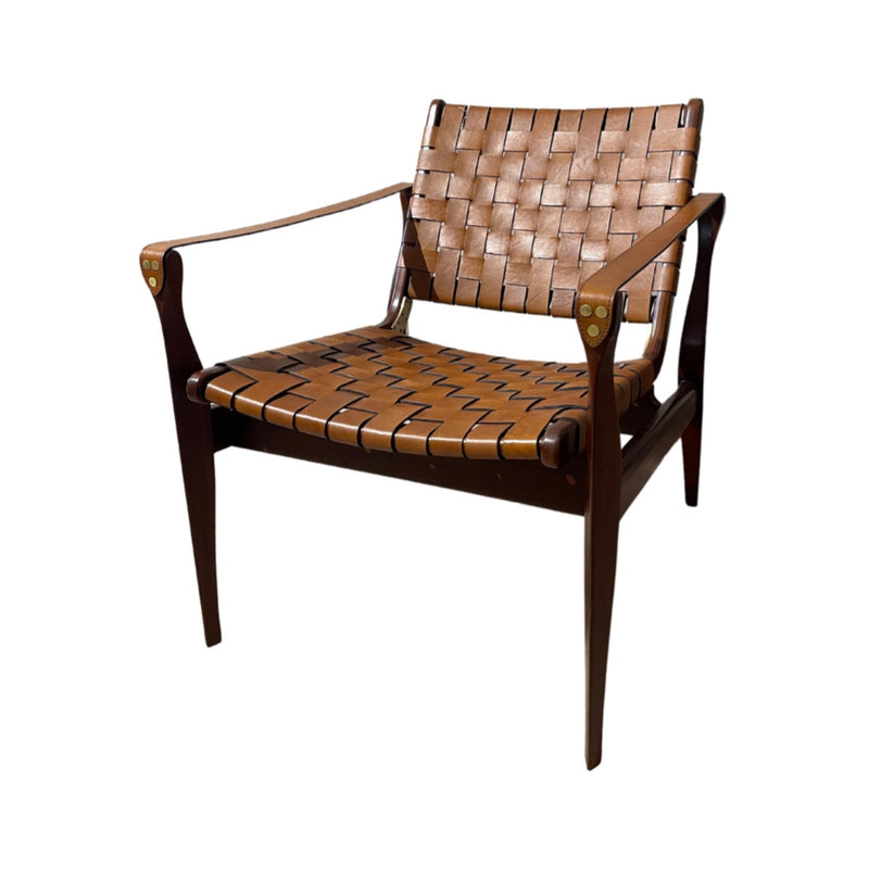 A chair with a solid mahogany frame and full Italian leather seat in a weaved design.