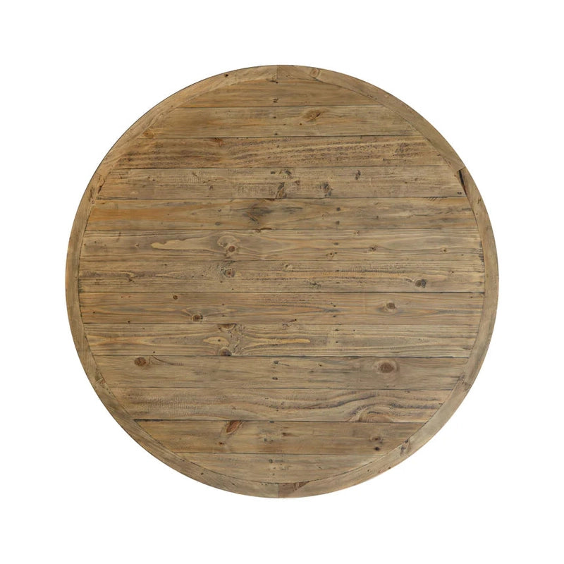 The New Jersey Dining Table is a round design with a natural wood finish, visible grain and knots, horizontal plank tabletop, and a slightly raised edge—bringing rustic charm to any inviting dining space.