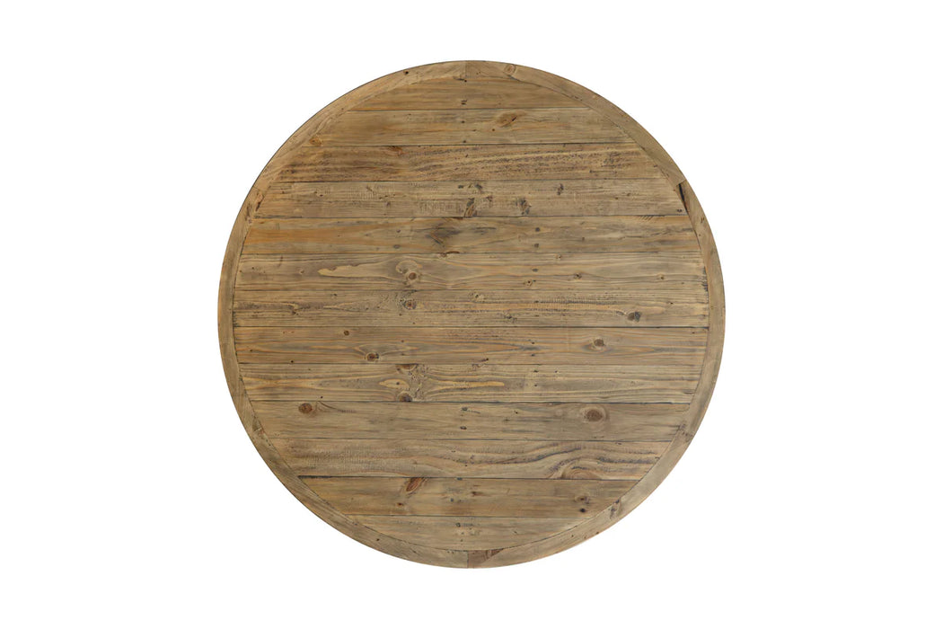 The New Jersey Dining Table is a round design with a natural wood finish, visible grain and knots, horizontal plank tabletop, and a slightly raised edge—bringing rustic charm to any inviting dining space.