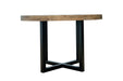 The New Jersey Dining Table features a thick, natural wood round top and a black metal crossed-leg base, creating an industrial look. It is shown against a plain white background.