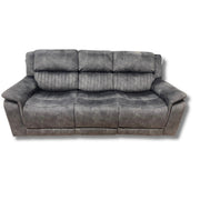 A dark grey reclining corner sofa with a washable grey fabric finish.