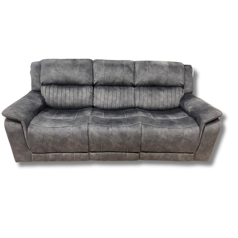 A dark grey reclining corner sofa with a washable grey fabric finish.
