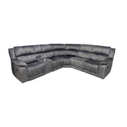 The Boston Corner Group is a large, dark gray L-shaped reclining sofa with plush cushions and two built-in recliners plus a wireless charging port, shown on a white background.