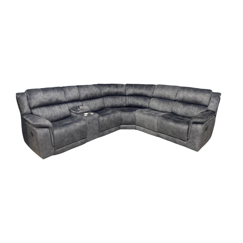 The Boston Corner Group is a large, dark gray L-shaped reclining sofa with plush cushions and two built-in recliners plus a wireless charging port, shown on a white background.