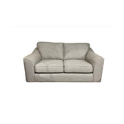 The Shelly by vendor-unknown is a modern two-seater fabric sofa in light gray with wide padded arms and two seat cushions, displayed against a white background.