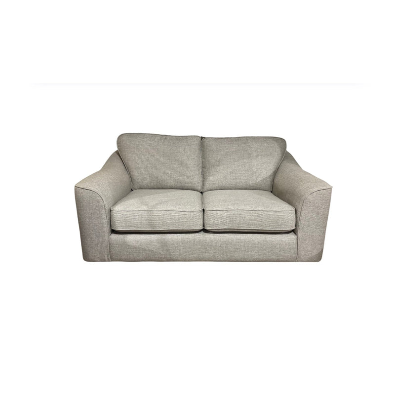 The Shelly by vendor-unknown is a modern two-seater fabric sofa in light gray with wide padded arms and two seat cushions, displayed against a white background.