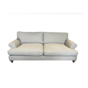 A light gray Monroe Sofa with two seat and back cushions, rounded armrests, upholstered in Irish aqua clean fabric, shown with wooden legs against a white background.