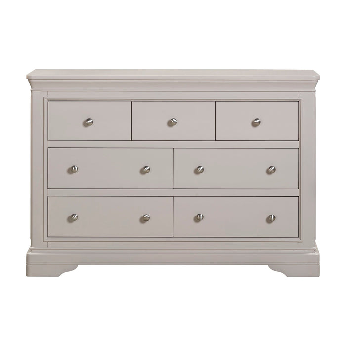 The Lima Wide Chest is a light gray wooden dresser with seven drawers and silver knobs. Part of our Taupe Bedroom Range, it features a classic, sturdy design and smooth finish—ideal to pair with bedside tables.