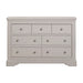 The Lima Wide Chest is a light gray wooden dresser with seven drawers and silver knobs. Part of our Taupe Bedroom Range, it features a classic, sturdy design and smooth finish—ideal to pair with bedside tables.