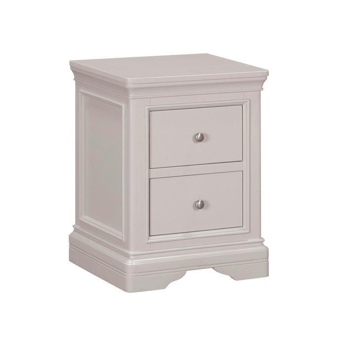 The Lima Bedside Locker is a compact, light gray wooden nightstand with two drawers featuring round metal knobs and decorative molding—ideal for the Lima Taupe Bedroom Range or any taupe bedroom décor.