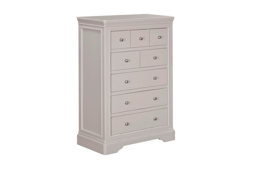 The Lima Tall Chest, in light gray wood, features six spacious drawers and four smaller upper drawers with round metal knobs, adding stylish storage to your bedroom furniture collection.