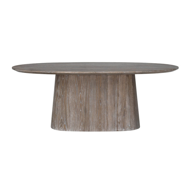 The Dakota Dining Table showcases a round, washed raw wood top with a natural wood grain finish, supported by a wide cylindrical pedestal base for a modern look.