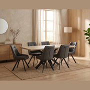 Modern dining room featuring the Dalton 160cm Ext Table & 6 Pedro Chairs, a sideboard with a vase, large window with sheer curtains, floor lamp, potted plant, and neutral decor on a woven rug.