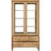 The Solstice Display Cabinet features a chevron pattern, glass doors, three interior shelves, and two carved drawers at the bottom, shown against a white background.