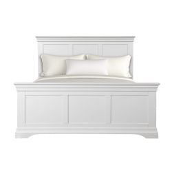 The Bella Bedframe is a white wooden bed frame with a high headboard and footboard, panel detailing, and a semi-gloss white finish. Shown with white pillows and bedding.