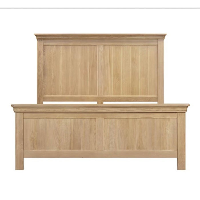 The Oslo Bedframe features a high headboard and footboard with vertical panels in a light oak finish, offering warmth and timeless style. Its simple, classic design makes it a standout piece in the Oslo range.