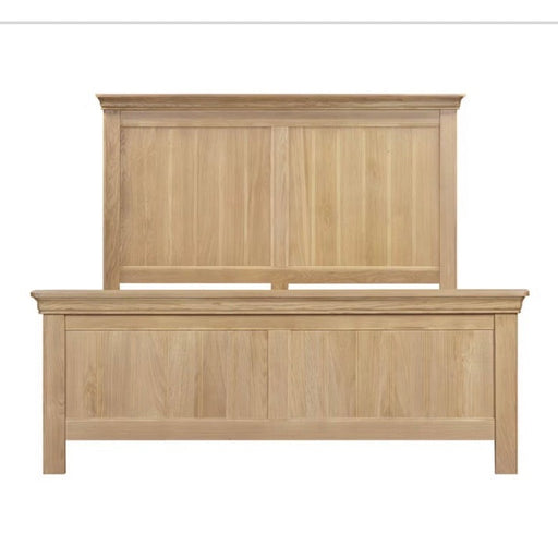 The Oslo Bedframe features a high headboard and footboard with vertical panels in a light oak finish, offering warmth and timeless style. Its simple, classic design makes it a standout piece in the Oslo range.