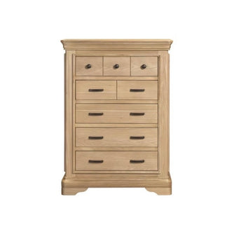 The Oslo Tall Chest features a light oak finish, eight drawers—three small upper and five large lower—with modern handles, all set on a sturdy base.