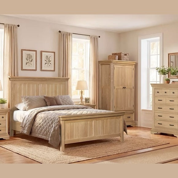 A cozy bedroom with light wood Oslo Wardrobe, matching bed, nightstands, and dresser in light oak. Neutral bedding, modern handles, botanical prints, and beige curtains create a warm inviting space.