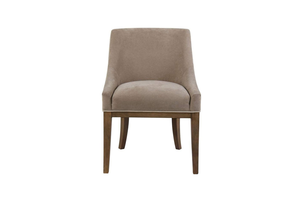 The Louis Dining Chair, featuring beige upholstery, a curved backrest, and wooden legs, is shown from the front against a white background.