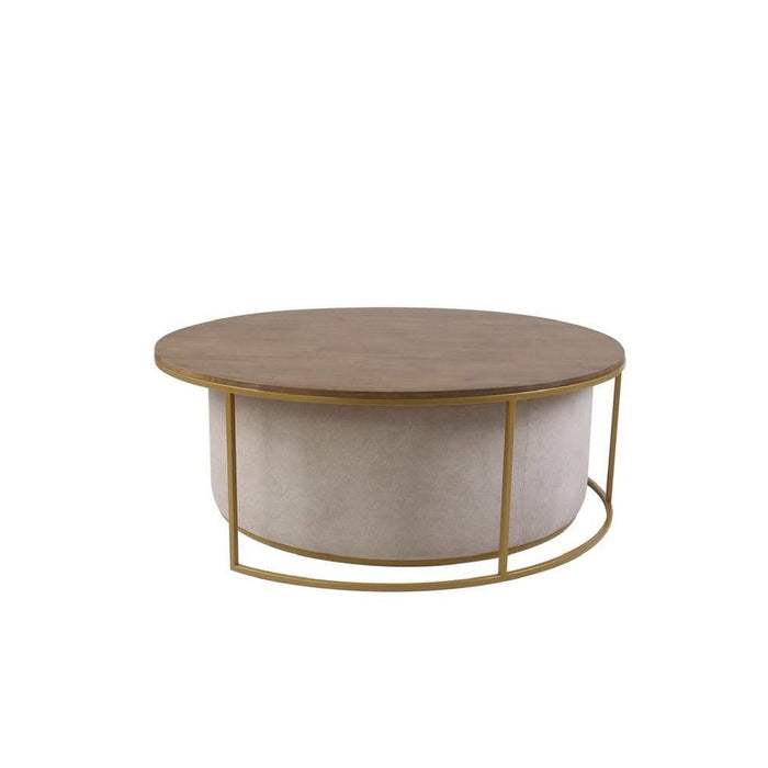 The Todi Round Coffee Table & Stool Set features a light wood top, cylindrical light gray base, and gold metal accents—ideal for contemporary spaces. Displayed against a plain white background.