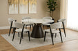 A modern dining room showcases the Fusion 150cm Round Table with 6 Fusion Chairs in light gray, complemented by a large plant, beige walls, abstract art, sheer curtains, and wood flooring.