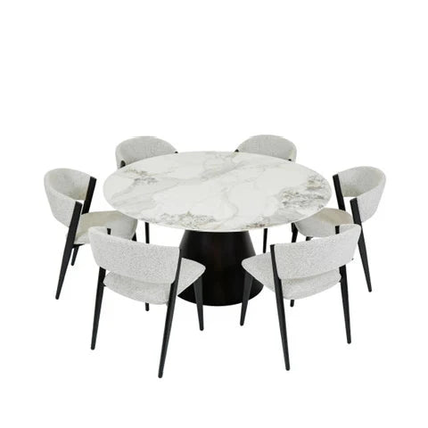 The Fusion Dining Table, a 150cm round marble top with black base, is paired with six light gray upholstered chairs featuring black legs, evenly arranged around the table.