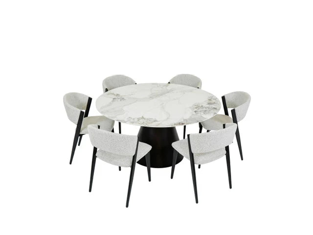 The Fusion Dining Table, a 150cm round marble top with black base, is paired with six light gray upholstered chairs featuring black legs, evenly arranged around the table.