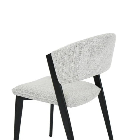 The Fusion 150cm Round Table + 6 Titan Chairs set features modern dining chairs with light gray upholstery and angled black legs, perfectly complementing the round table—ideal for stylish dining spaces, as shown against a white background.