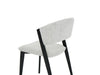The Fusion 150cm Round Table + 6 Fusion Chairs set includes modern dining chairs with light gray upholstery and black angled legs, showcasing a minimalist style and ideal for a sleek dining area, shown against a plain white background.