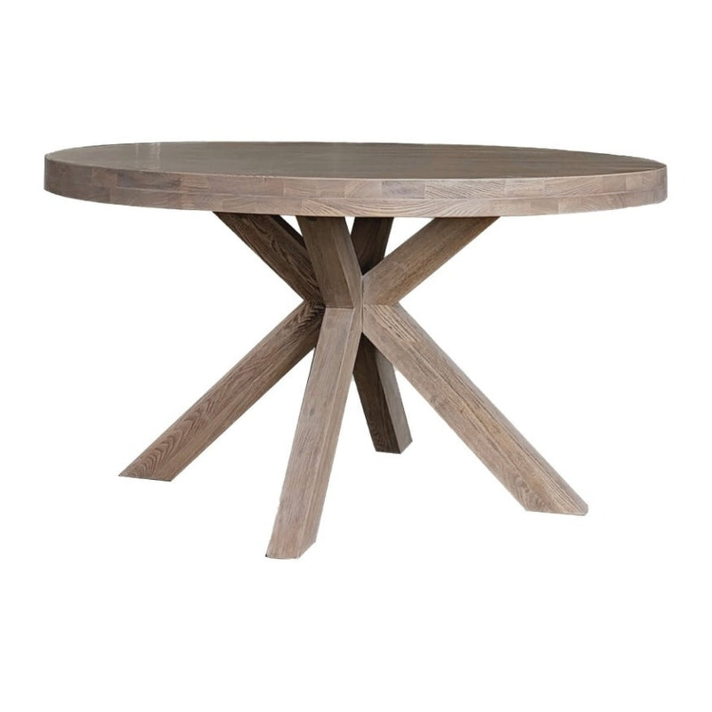 Rustic or farmhouse-style round table with a planked top and four-legged wooden pedestal base.