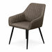 The Olson 1.5 Table + 6 Enzo Chairs set features modern chairs with brown upholstered seats, vertical stitching, slim black metal legs—ideal for a contemporary dining space and shown against a white background.