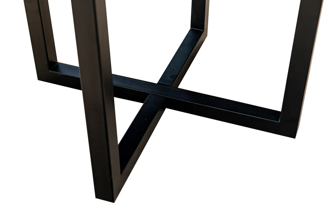 Close-up of the black metal legs of the New Jersey Dining Table, forming an intersecting rectangular frame on a white background.