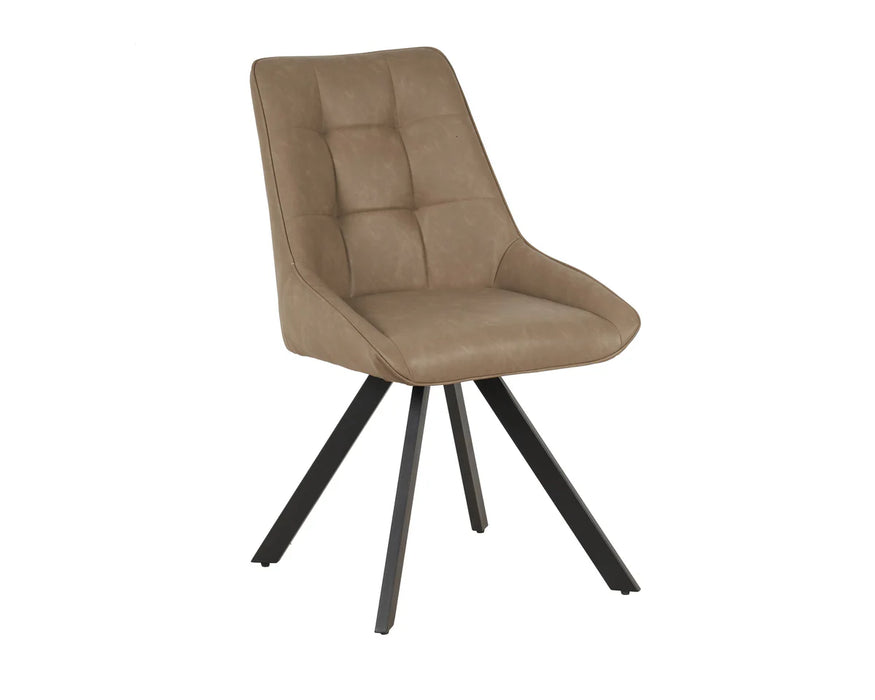 The Pedro Dining Chair features tan upholstery, a cushioned tufted backrest and seat, black angled metal legs, and a sleek armless design for a modern look in any dining space.