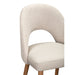 The Florence Counter Stool features a curved, upholstered backrest in light beige fabric, a padded cream-colored seat, and wooden legs, shown against a white background.