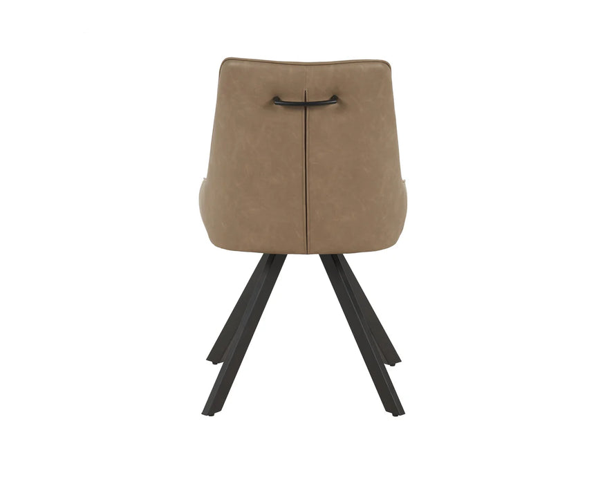 The Pedro Dining Chair features a tan upholstered backrest, black handle, and four black angled metal legs, shown from behind against a white background.