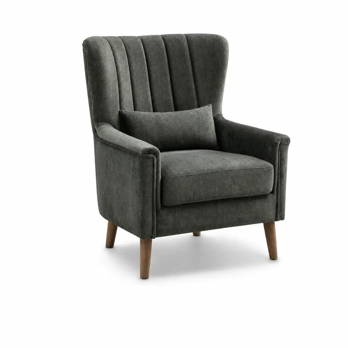 The Charlotte Accent Chair features dark gray velvet and linen upholstery, angled wooden legs, a vertically tufted backrest, and a matching rectangular lumbar pillow—ideal for adding elegance to your home décor.
