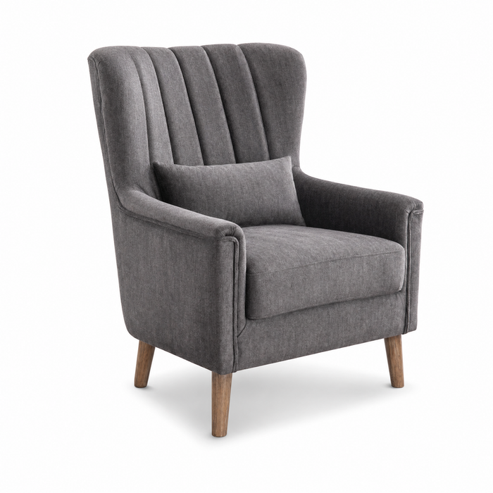 The Charlotte Accent Chair is a modern gray upholstered armchair with vintage-inspired vertical tufted back, matching lumbar pillow, and wooden legs, displayed on a plain white background.