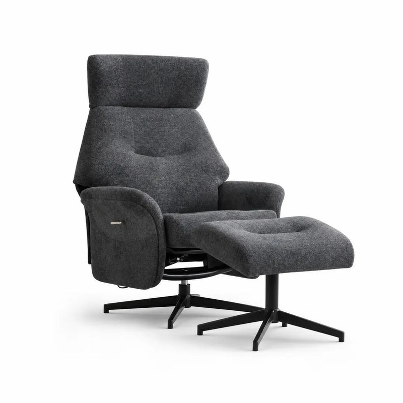 The Mira Swivel Chair + Footstool features a modern dark gray design with a high backrest, angled armrests, extended footrest, and black metal swivel base in textured fabric—ideal for adding style and comfort to any living space.