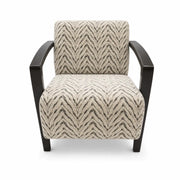The Falcon Accent Chair is a modern accent chair upholstered in cream fabric with a black chevron zigzag pattern, and features black wooden arms and legs. This contemporary chair is shown from the front.