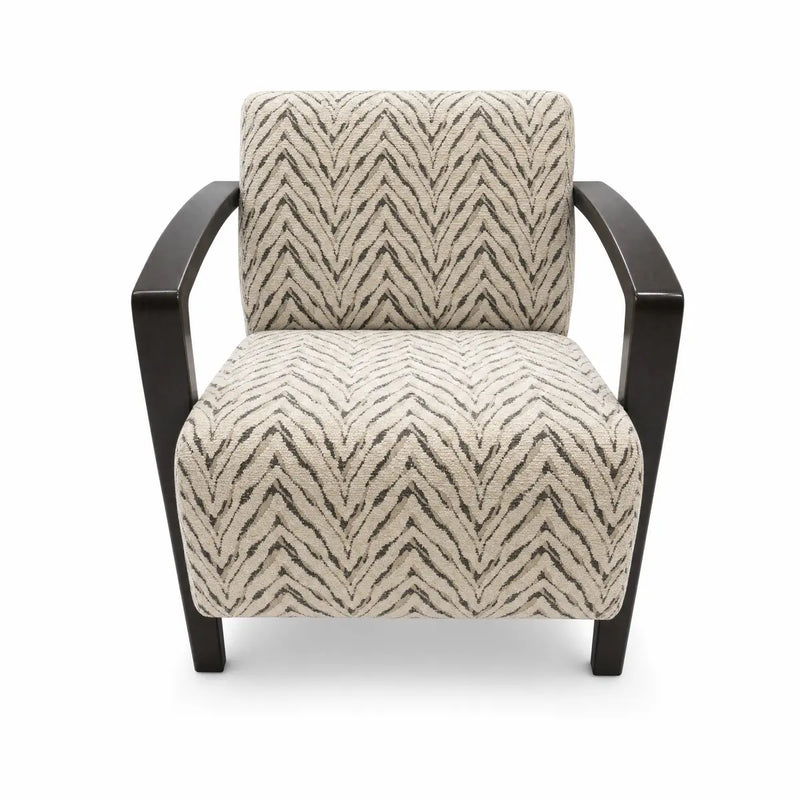 The Falcon Accent Chair is a modern accent chair upholstered in cream fabric with a black chevron zigzag pattern, and features black wooden arms and legs. This contemporary chair is shown from the front.