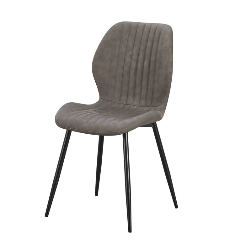 The Lyra Dining Chair is a modern upholstered piece with a grey cushioned seat and backrest featuring vertical stitching, supported by four slender black metal legs.