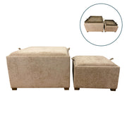 The Maya tray table pouffes in Cappuccino come as a set of 2. Shown side by side, each pouffe features handles, wooden legs, hidden storage, and wooden trays on top for versatile use as tables or ottomans.