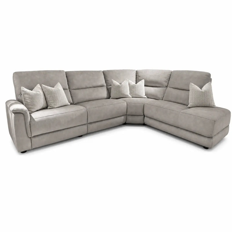 The Lucas Corner Sofa showcases a modern L-shaped sectional design in light gray, with cushioned seats and backs for comfort. It comes with five matching throw pillows in coordinating light tones, washable fabric upholstery, and slightly angled armrests that enhance both style and relaxation.