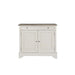 The Lyon 2 Door Sideboard features a simple, classic design in white wood with two doors, a single drawer above, and a brown wood top. Round door knobs complete its farmhouse look, making it an ideal addition to any home.