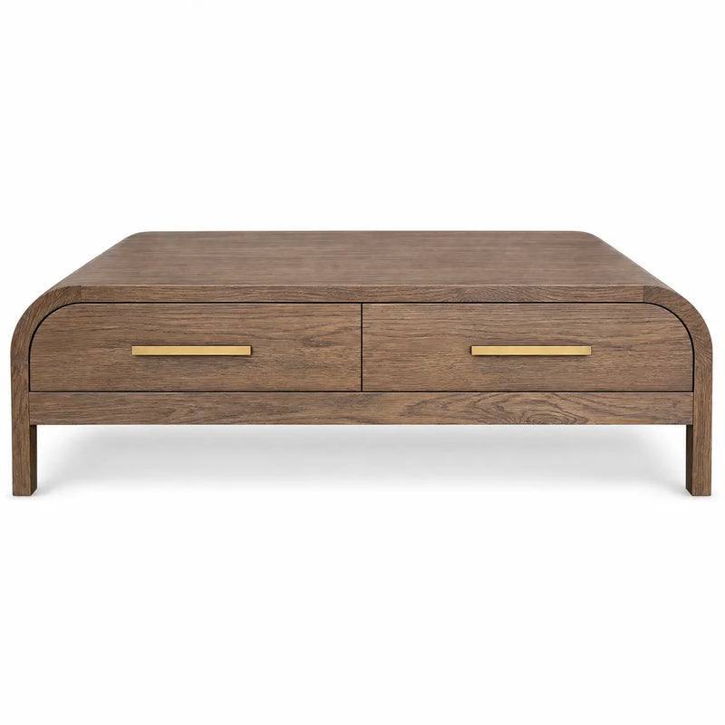 Sienna Coffee Table: A rectangular wooden coffee table with rounded edges, featuring two drawers accented by horizontal gold handles, and a minimalist modern design—perfect for those seeking both style and storage in their living space.